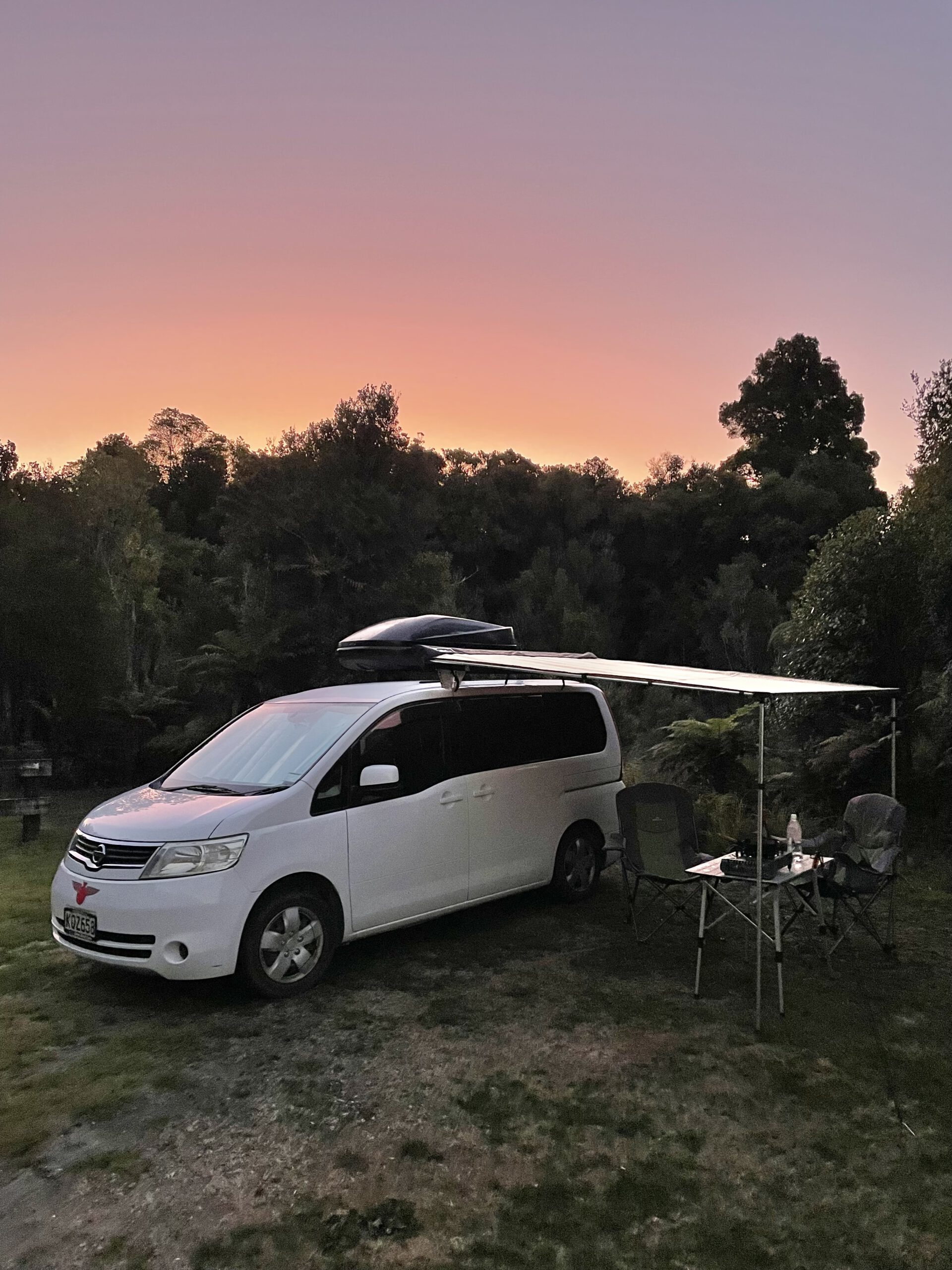 Setting up camp right after buying our second campervan in New Zealand