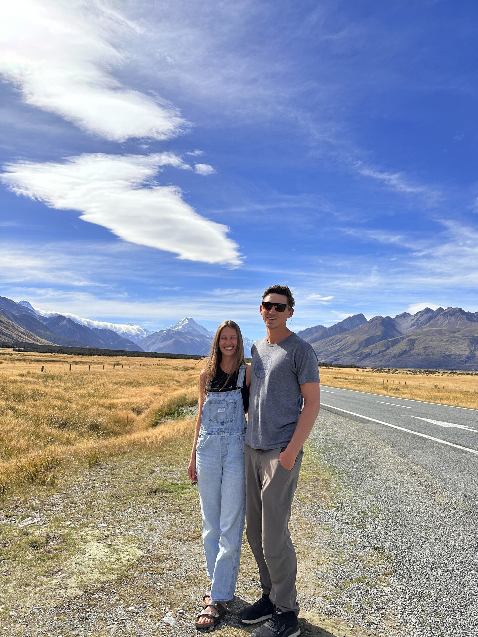 Standing in front of Mount Cook in New Zealand while on a working holiday visa