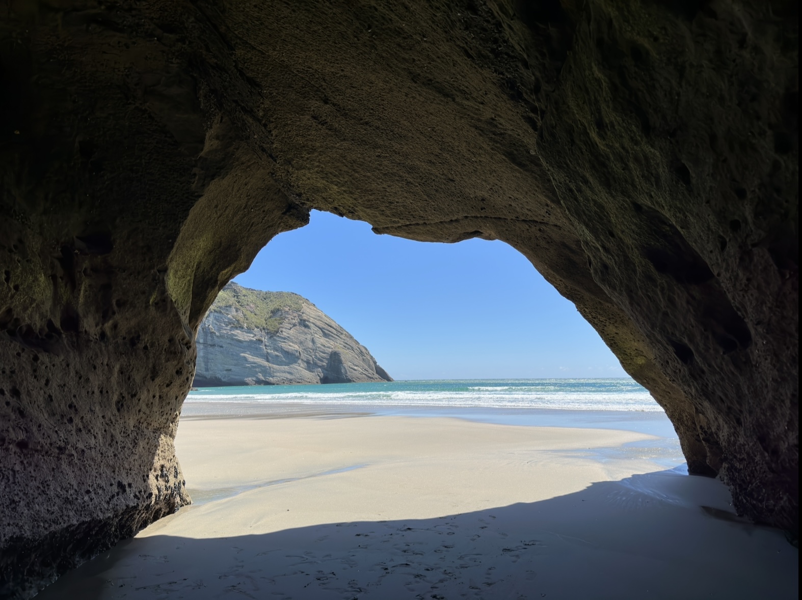 Cave overlooking a New Zealand beach near Golden Bay